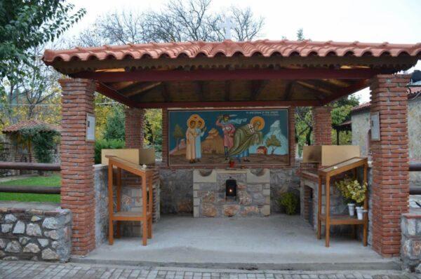 Orthodox icon in street shrine in prokopi, evia island, greece