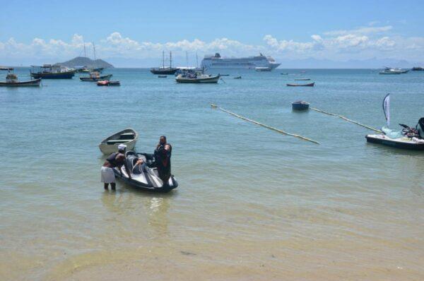 jetski, boats, cruise ship in the beautiful blue waters of aramacao dos buzios in brazil